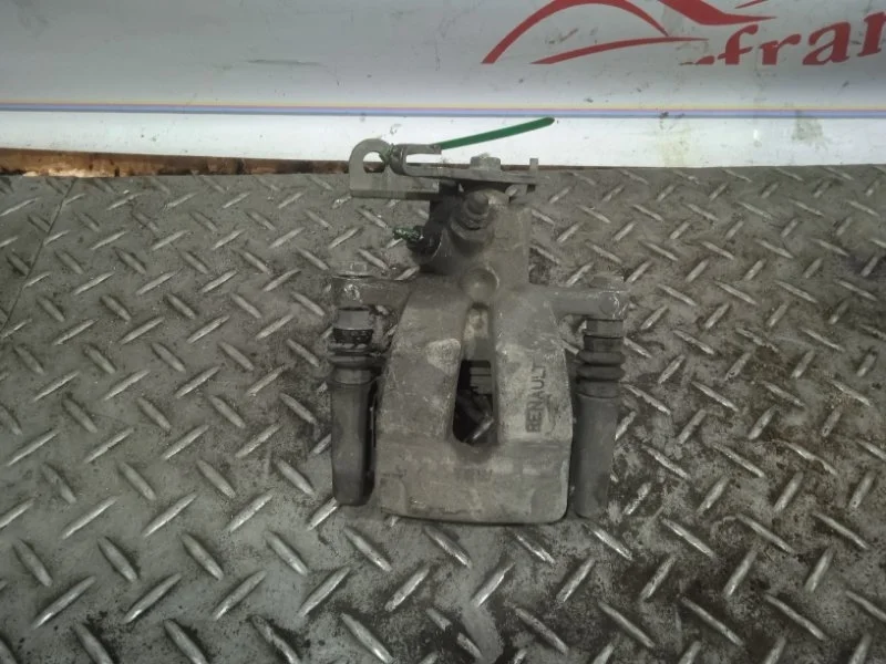 Суппорт тормозной Renault Megane 7701049108 2, задний левый