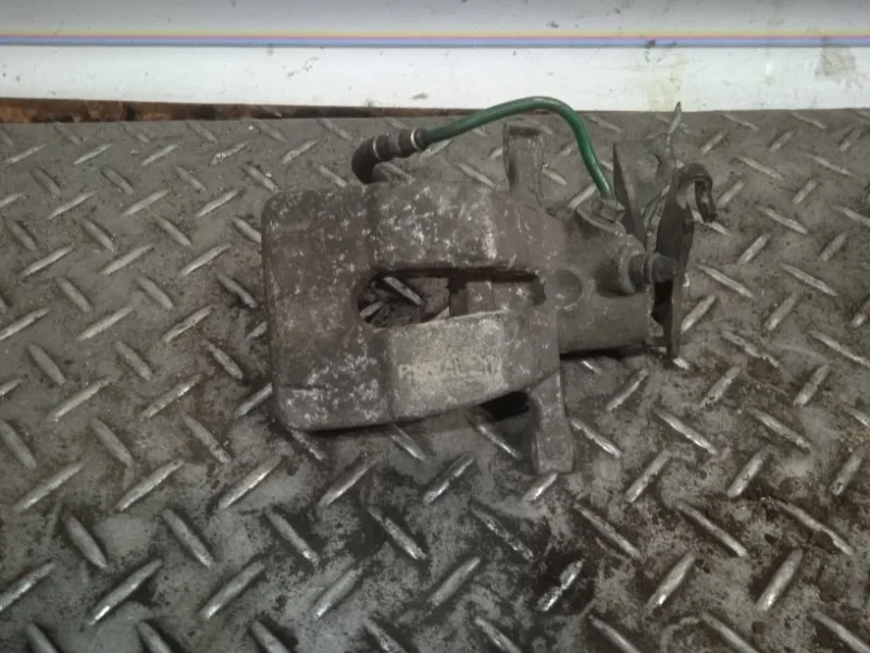 Суппорт тормозной Renault Megane 7701049108 2, задний левый