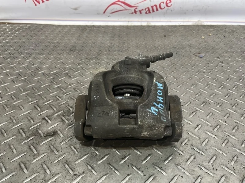 Суппорт тормозной Ford Mondeo 1583140 4, передний левый