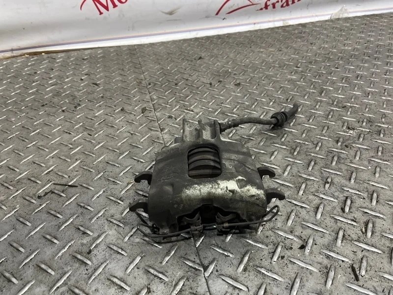 Суппорт тормозной Ford Focus 1998-2004 4346373 1, передний левый