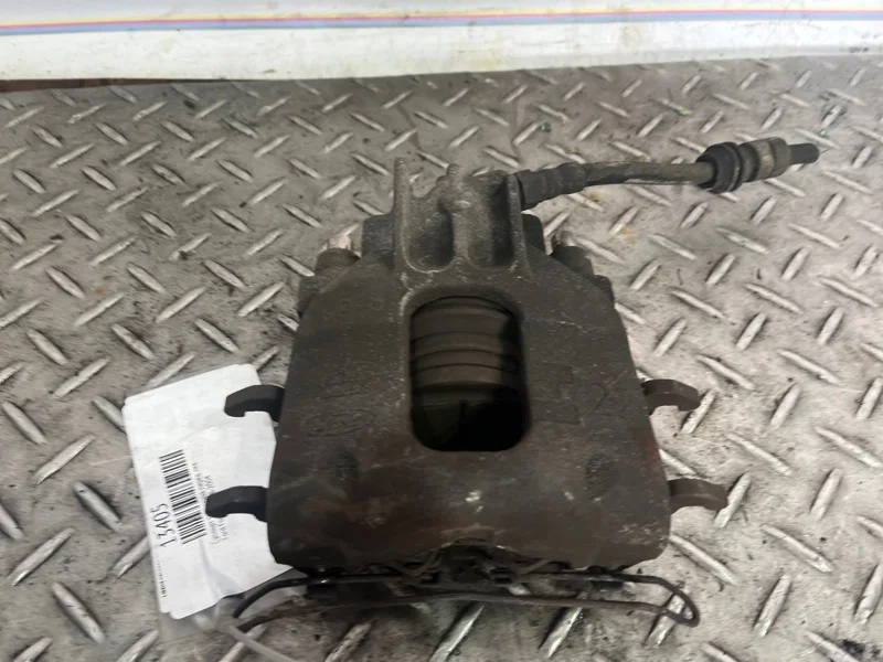 Суппорт тормозной Ford Focus 1998-2004 4346373 1, передний левый