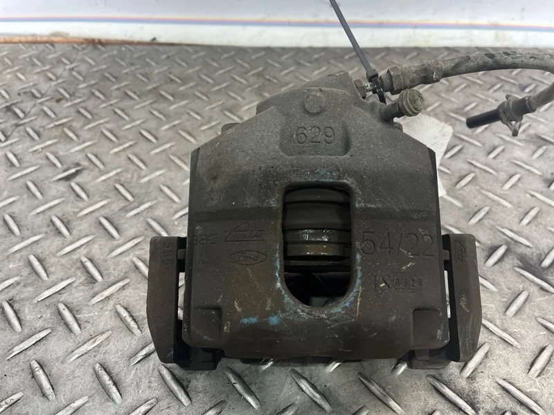 Суппорт тормозной Ford Fiesta 2002-2008 1478500 MK5, передний левый