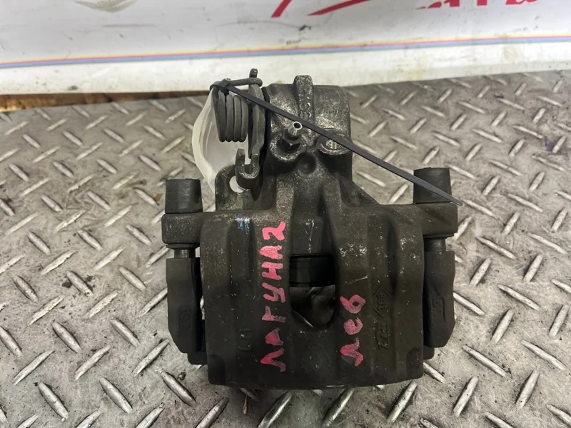 Суппорт тормозной Renault Laguna 7701049108 2, задний левый