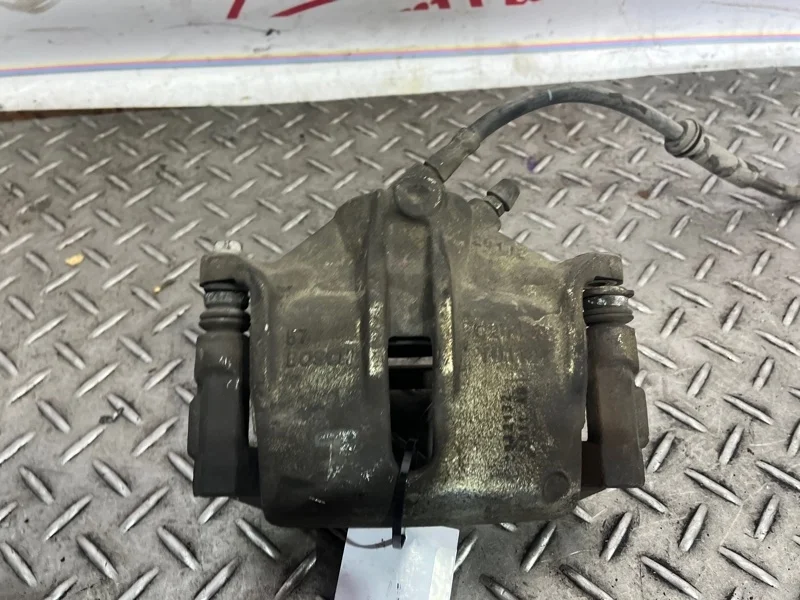 Суппорт тормозной Ford Mondeo 1500664 3, передний левый