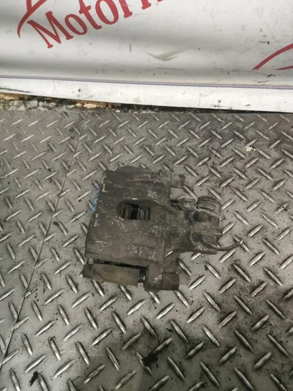 Суппорт тормозной Renault Laguna 2004 7701049108 2, задний левый