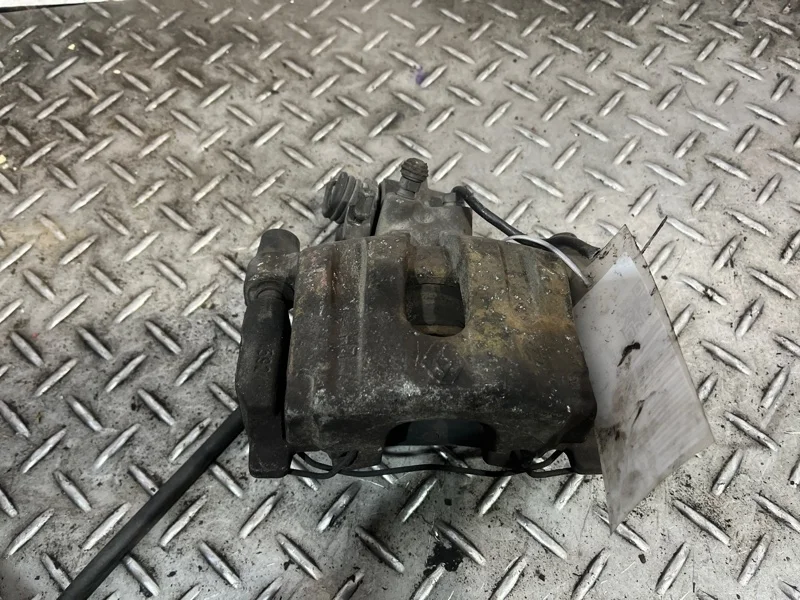 Суппорт тормозной Renault Laguna 2001-2005 7701049108 2, задний левый