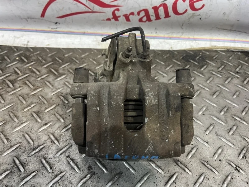 Суппорт тормозной Renault Laguna 2001-2007 7701049108 2, задний левый