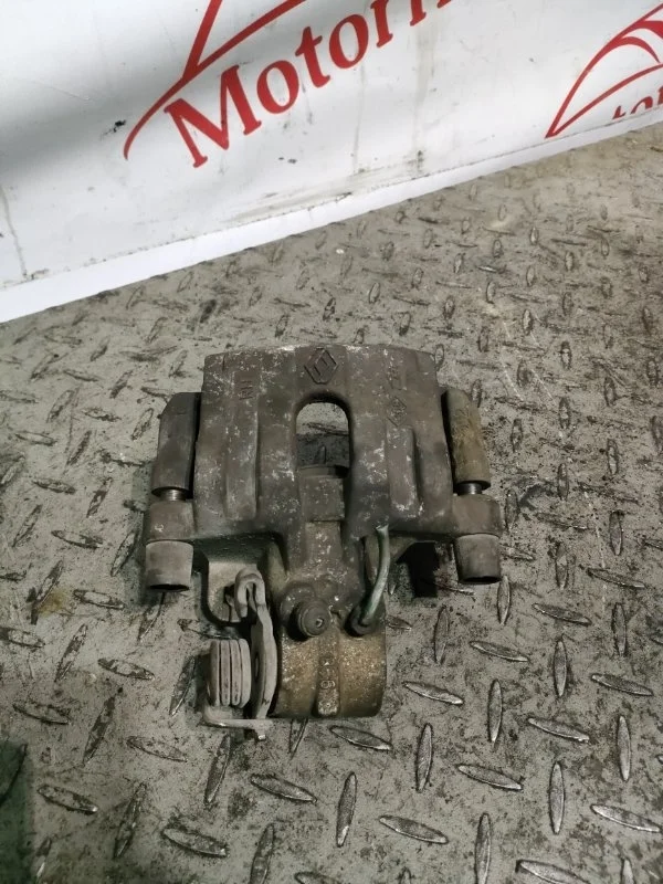 Суппорт тормозной Renault Laguna 2004 7701049109 2, задний правый