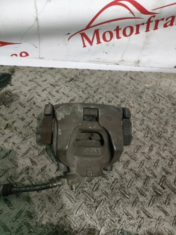 Суппорт тормозной Ford Mondeo 2008 1583140 4, передний левый