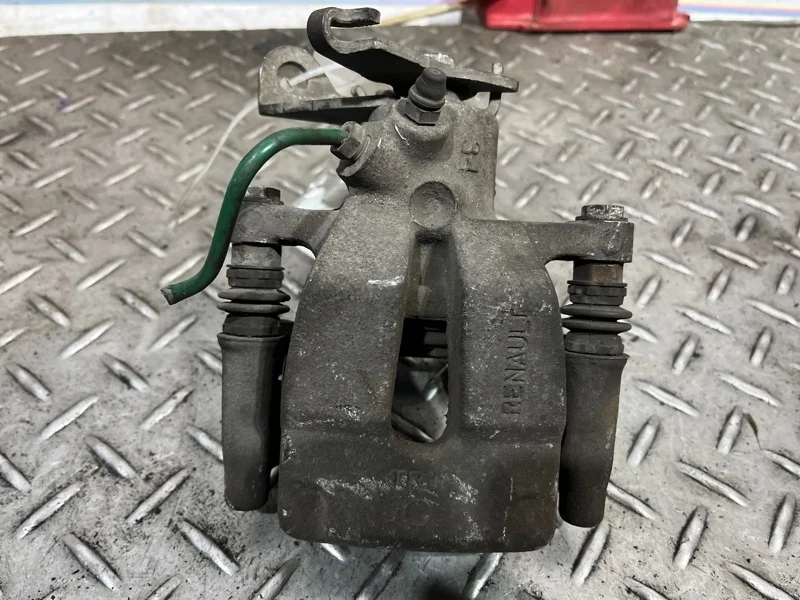 Суппорт тормозной Renault Megane 2002-2009 7701049108 2, задний левый