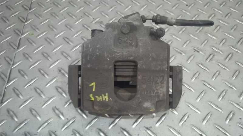 Суппорт тормозной Ford Fiesta 1478500 MK5, передний левый