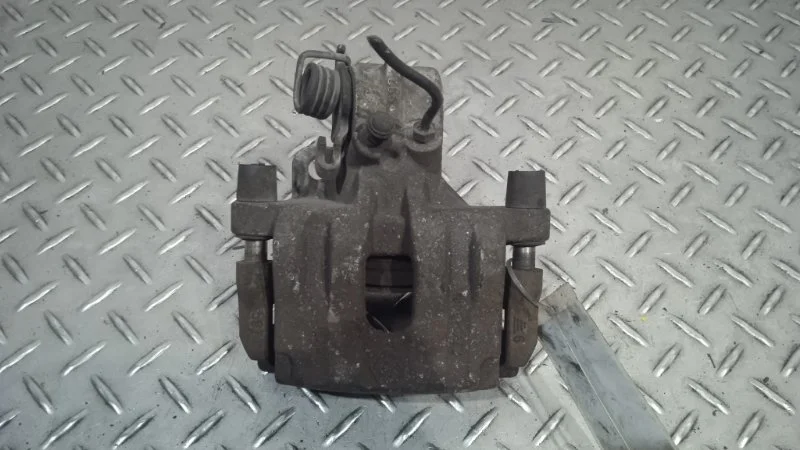 Суппорт тормозной Renault Laguna 7701049108 2, задний левый