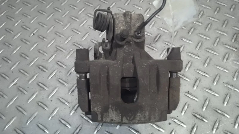 Суппорт тормозной Renault Laguna 7701049108 2, задний левый