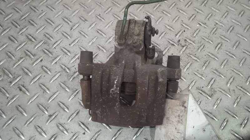 Суппорт тормозной Renault Laguna 7701049109 2, задний правый