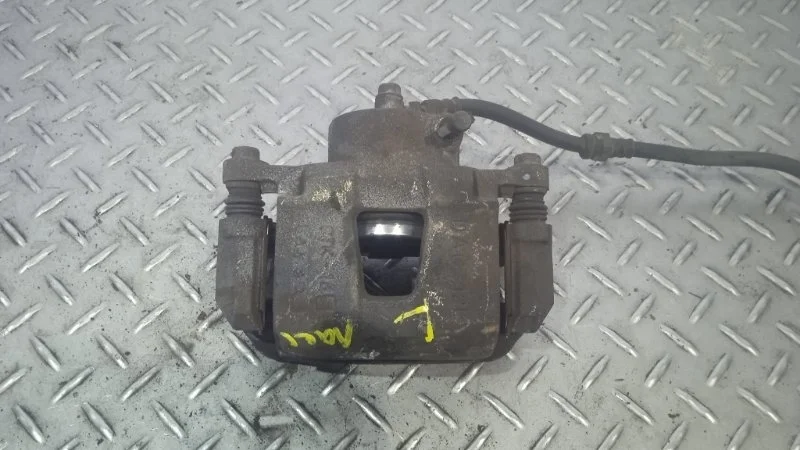 Суппорт тормозной Chevrolet Lacetti 96549788 1, передний левый