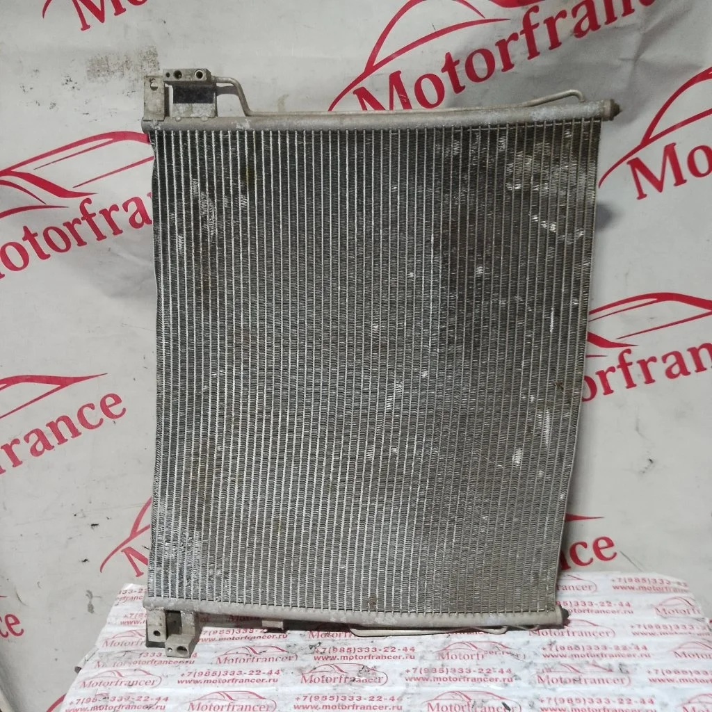 Радиатор кондиционера (конденсер) Nissan Navara 2006 92100EB00A D40