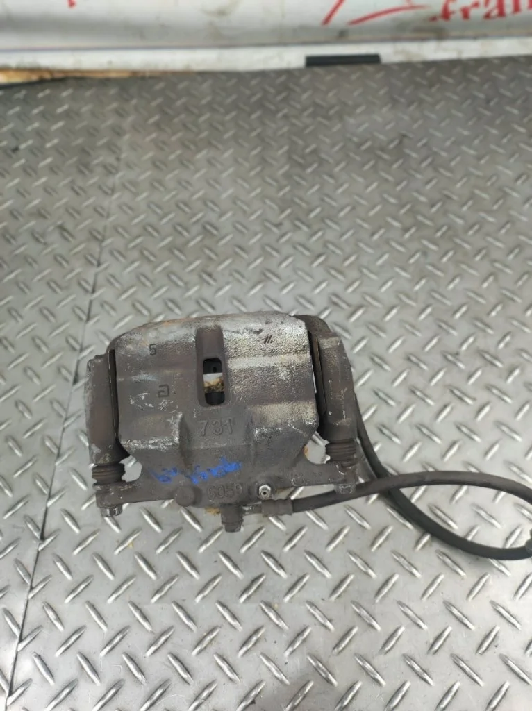 Суппорт тормозной Nissan Qashqai 2009 41011JD00A J10 1.5 DCI K9K, передний левый