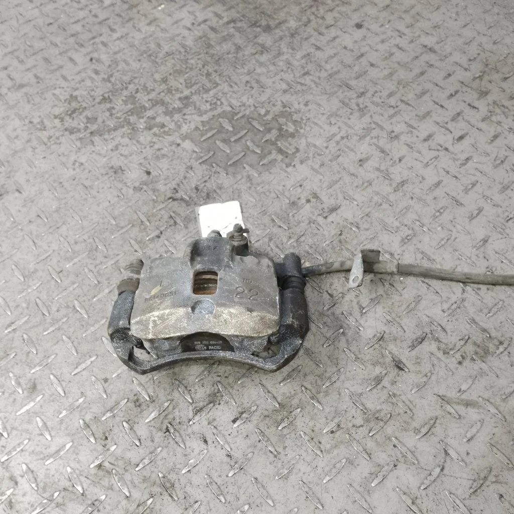 Суппорт тормозной Hyundai Getz 581101C100, передний левый