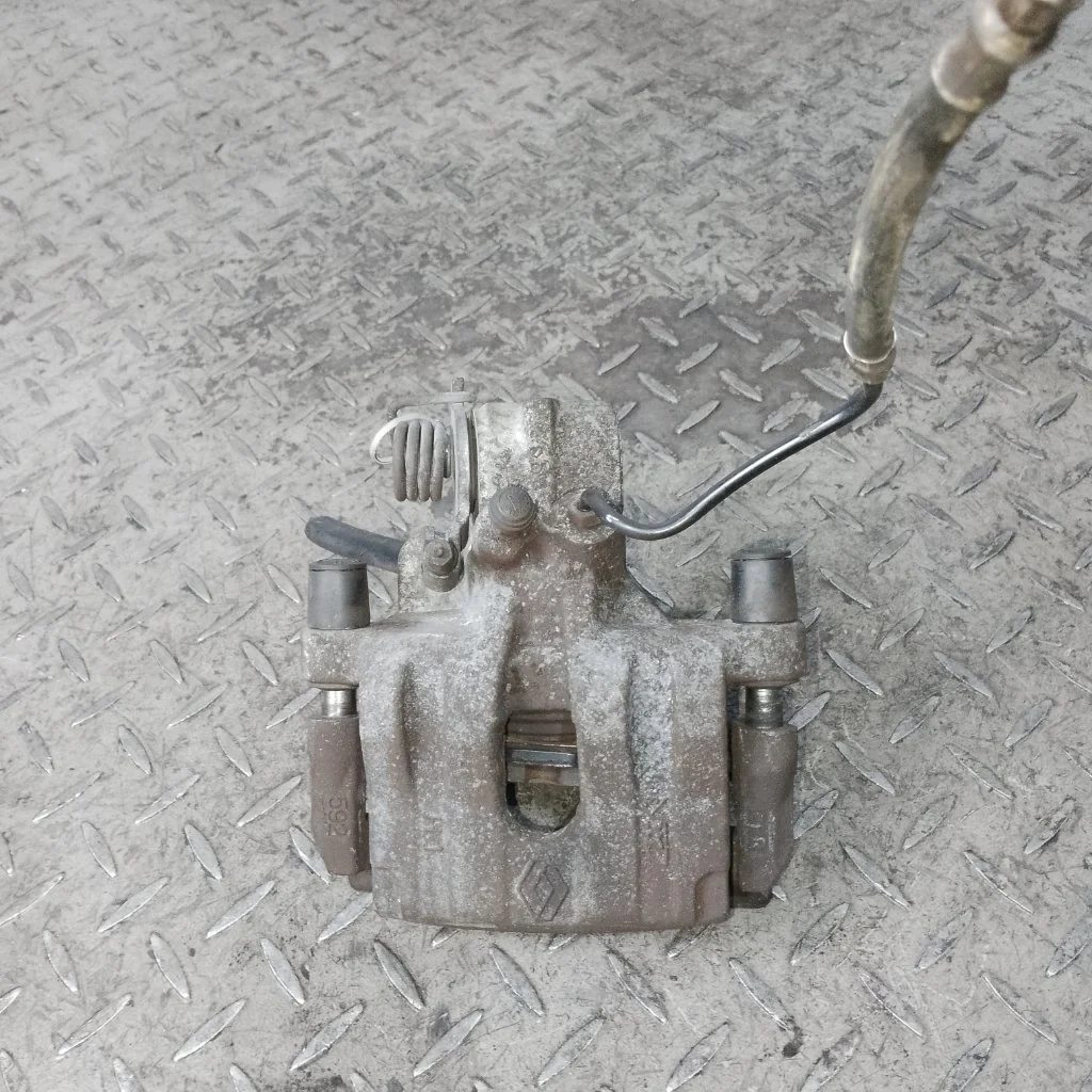 Суппорт тормозной Renault Espace 2003 7701049108 4, задний левый