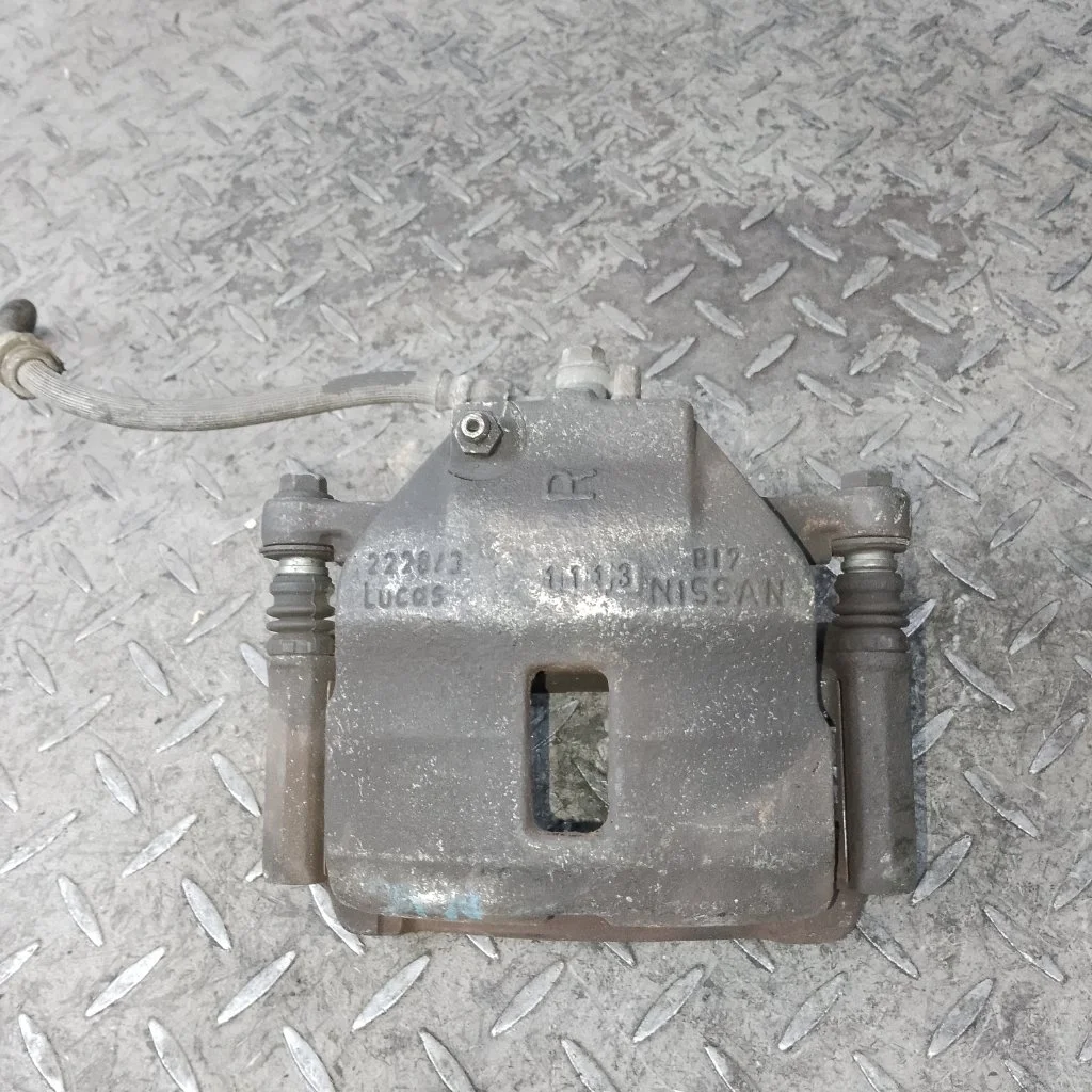 Суппорт тормозной Nissan Almera 410012F522, передний правый