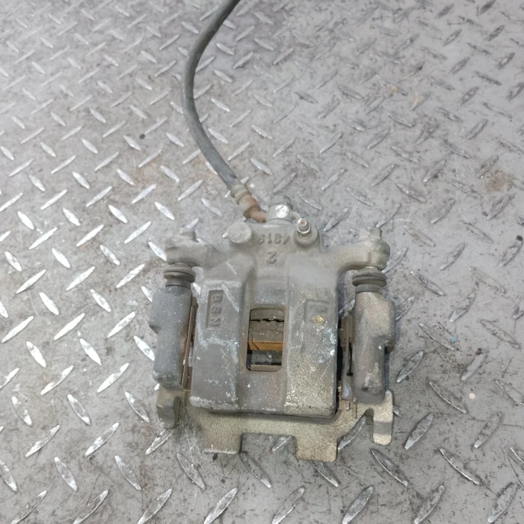 Суппорт тормозной Nissan Murano 41011EG50A Z51, задний левый