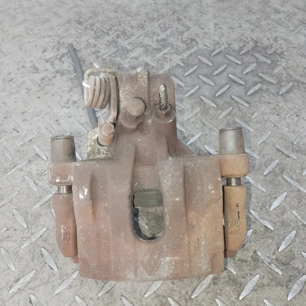 Суппорт тормозной Renault Laguna 2002 7701049108 2, задний левый