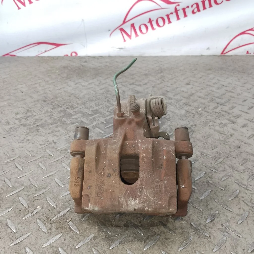 Суппорт тормозной Renault Laguna 7701049109 2, задний правый