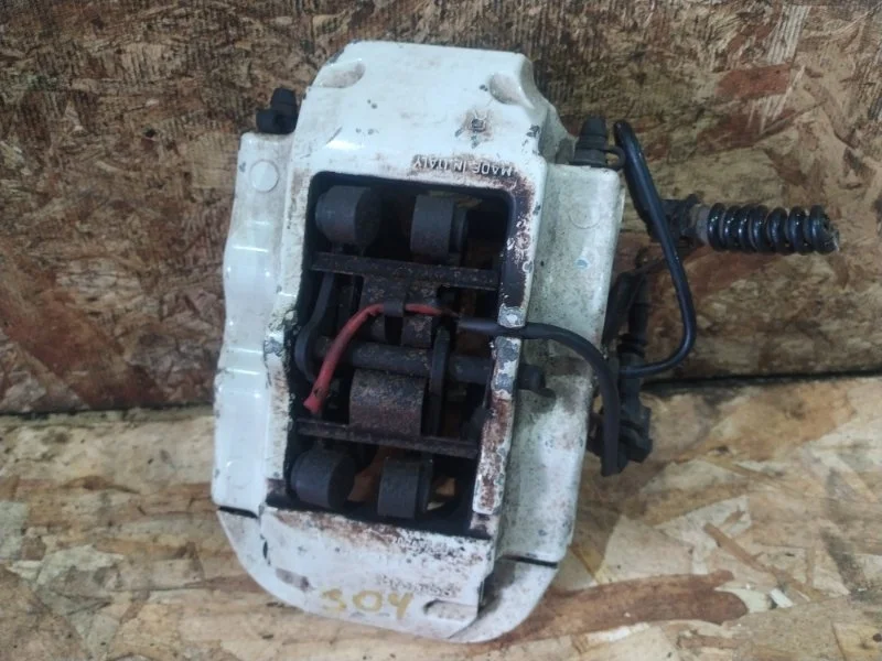 Суппорт тормозной правый Volkswagen Touareg 2009 7LA