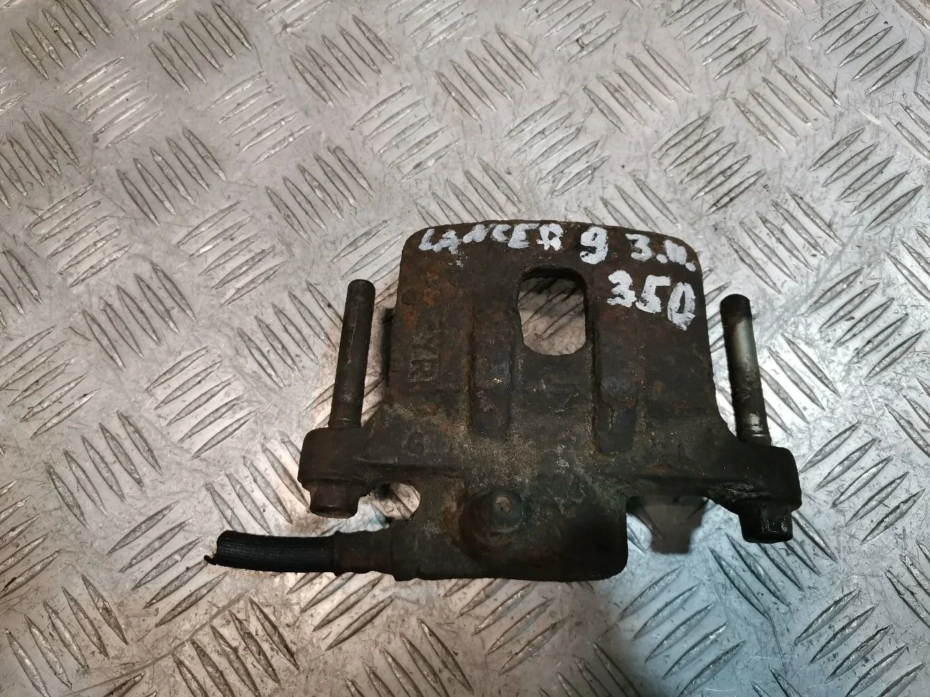 суппорт задний правый Mitsubishi lancer 9