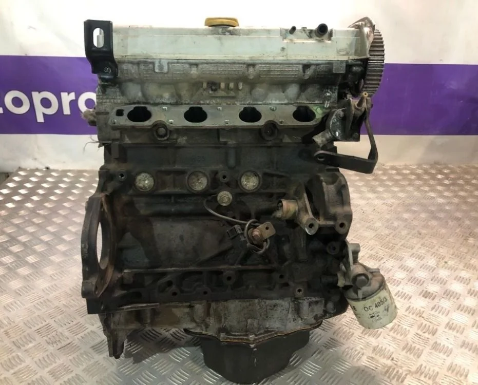Двигатель без ГБЦ (по запчастям) X18XE 1.8 Opel