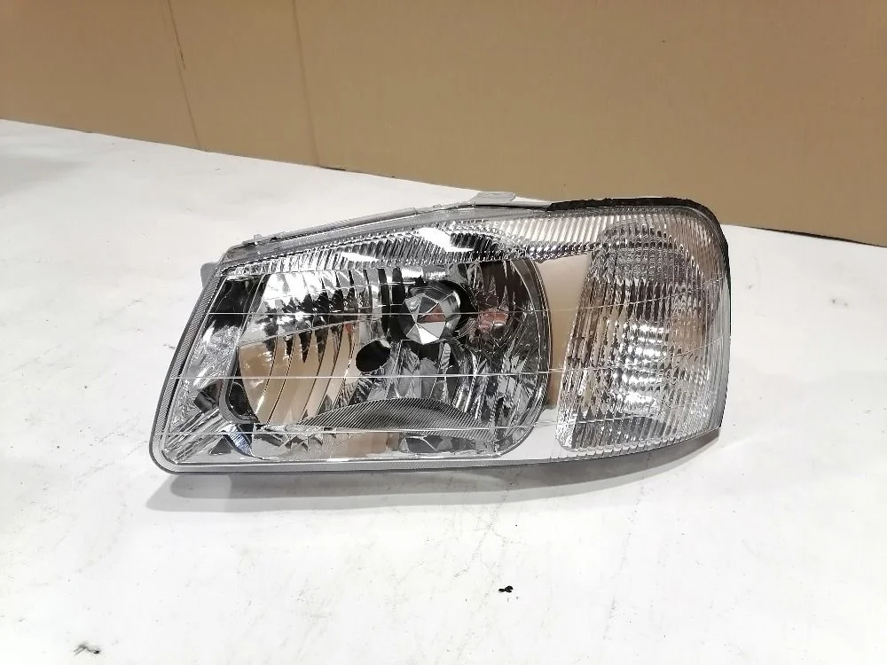 Фара левая Hyundai Accent II (1999—2012) 9210125010