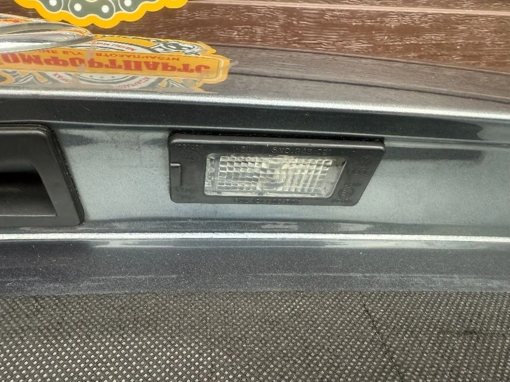 Плафон подсветки номера Volkswagen Jetta VI (2010—2015)