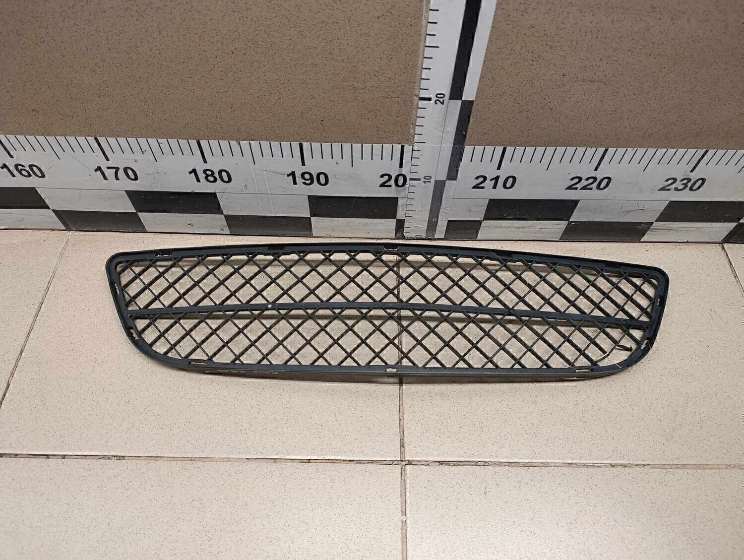 Решетка в бампер центральная Almera Classic (B10) 2006-2013