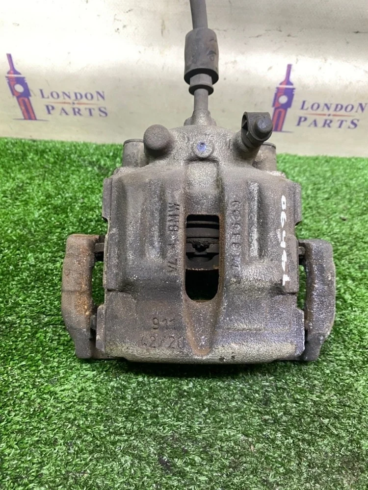 Суппорт тормозной BMW 320i E90
