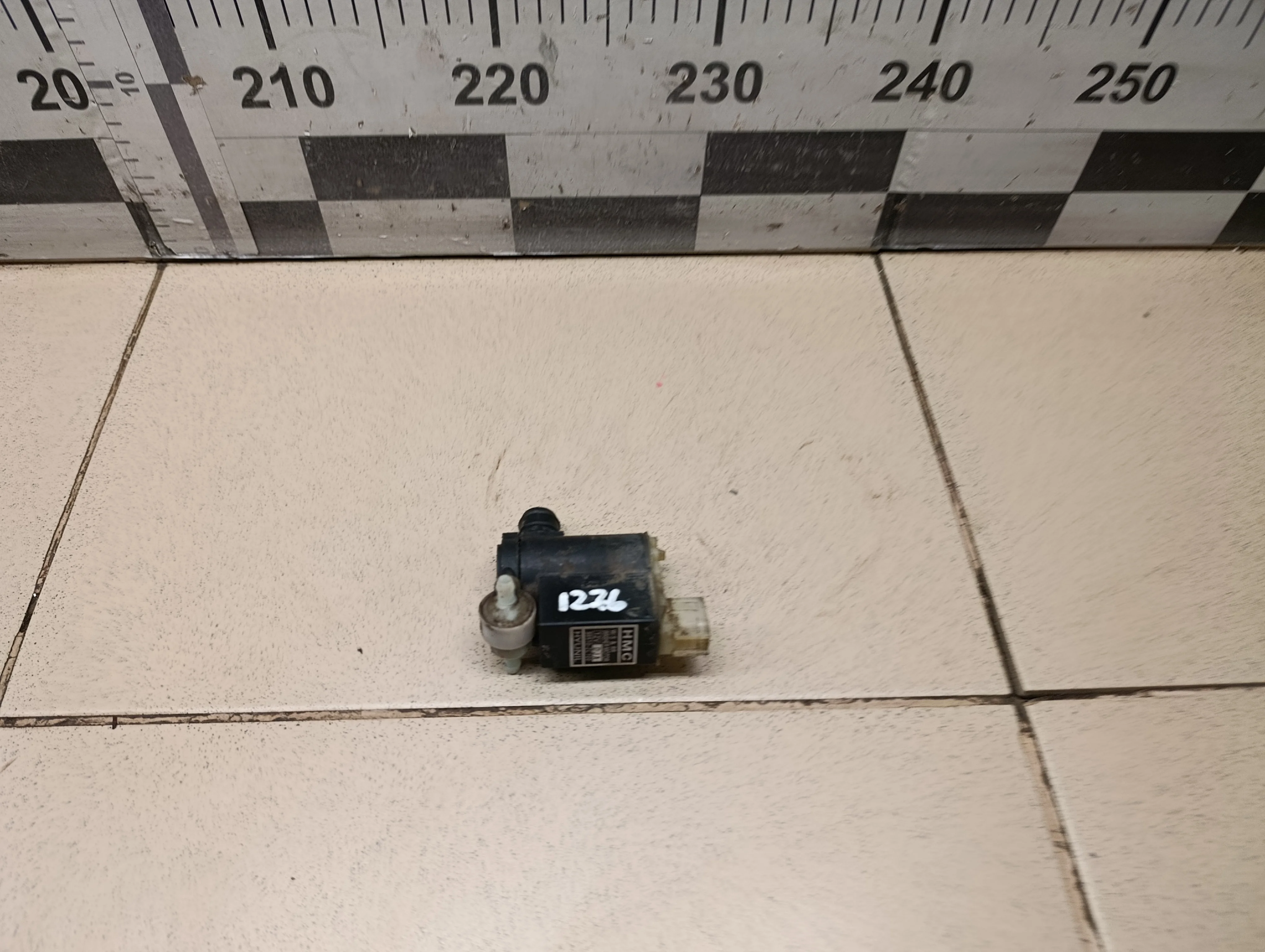 Насос омывателя Tucson 2004-2010