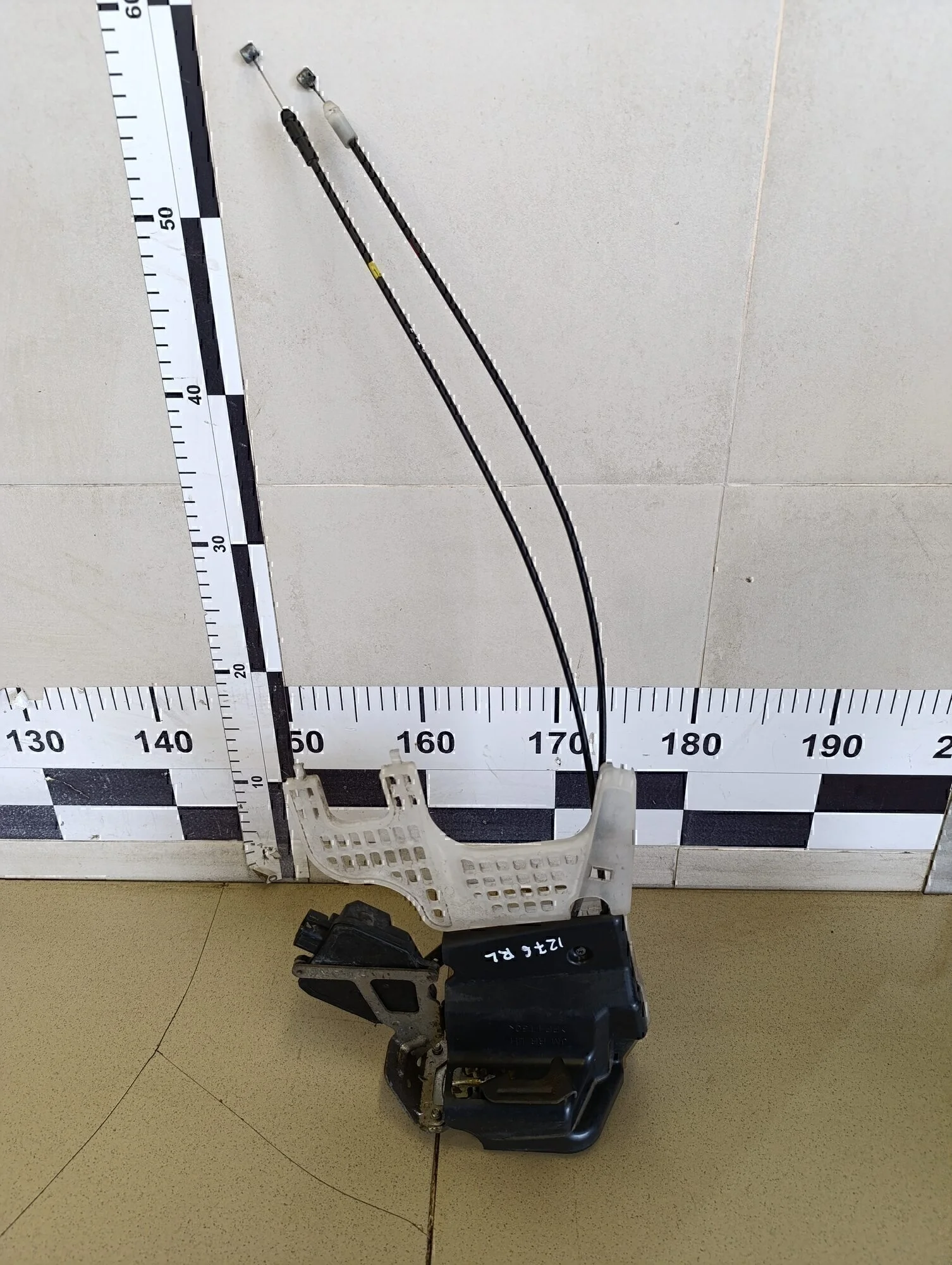 Замок двери задней левой Tucson 2004-2010