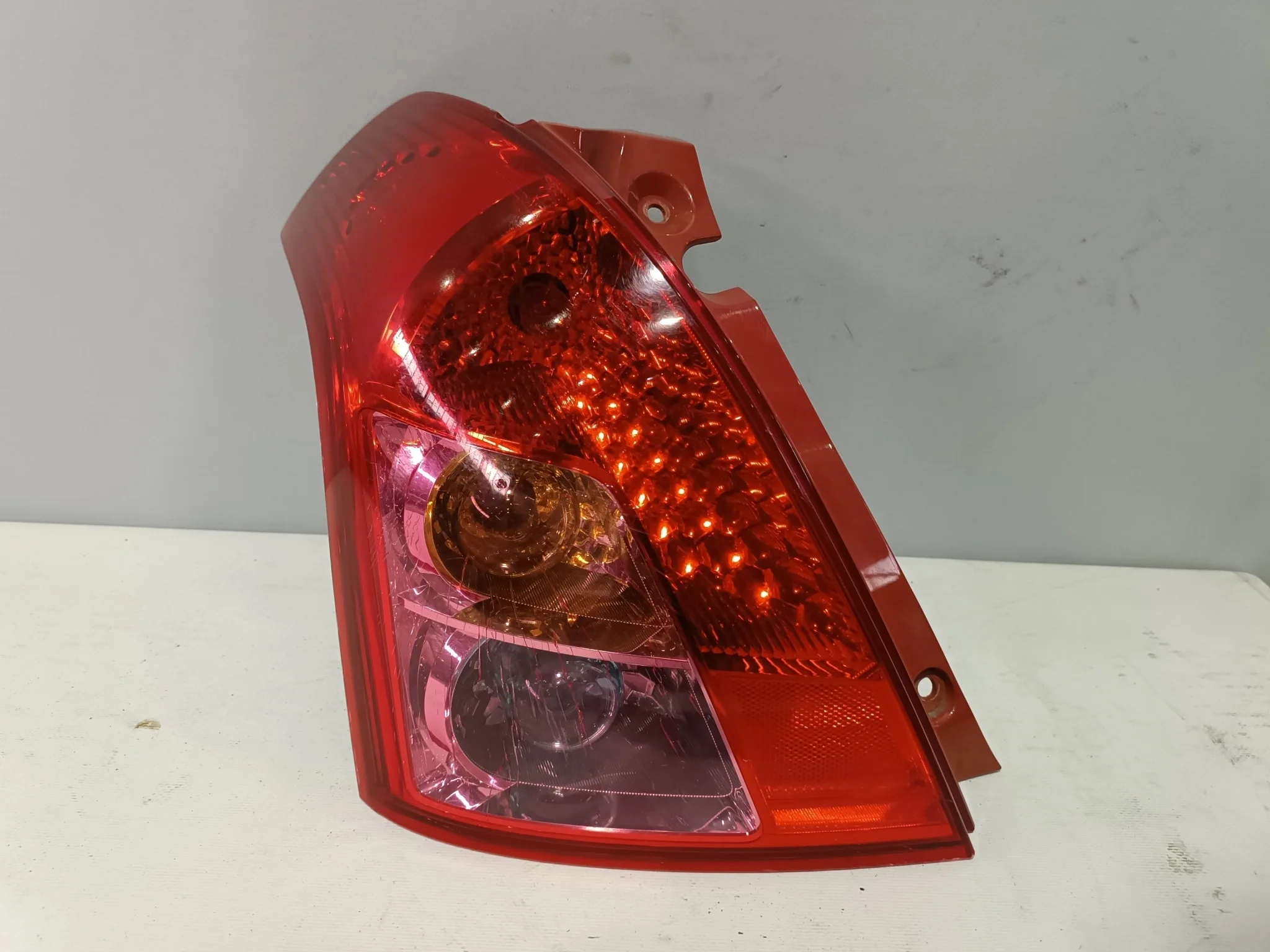 ФОНАРЬ SUZUKI ЛЕВО 3567073K00 XA6198