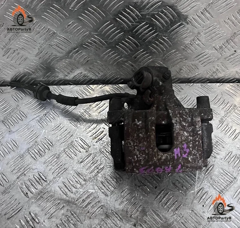 Суппорт тормозной задний левый Mazda 3 BK ZY-VE 1,5 л.
