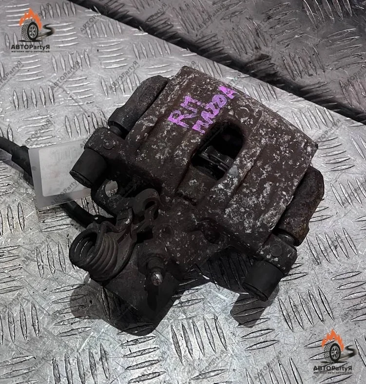 Суппорт тормозной задний правый Mazda (Мазда) 3 BK ZY-VE 1,5 л.
