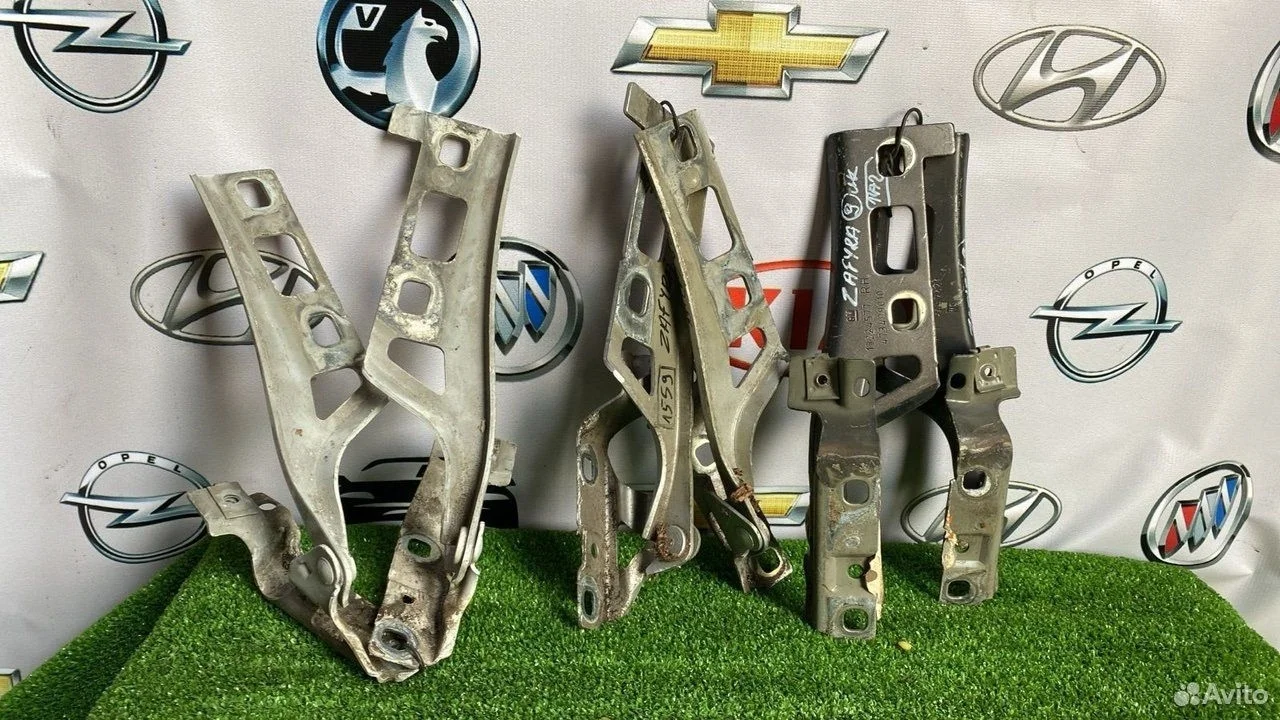 Петля капота передняя левая opel zafira
