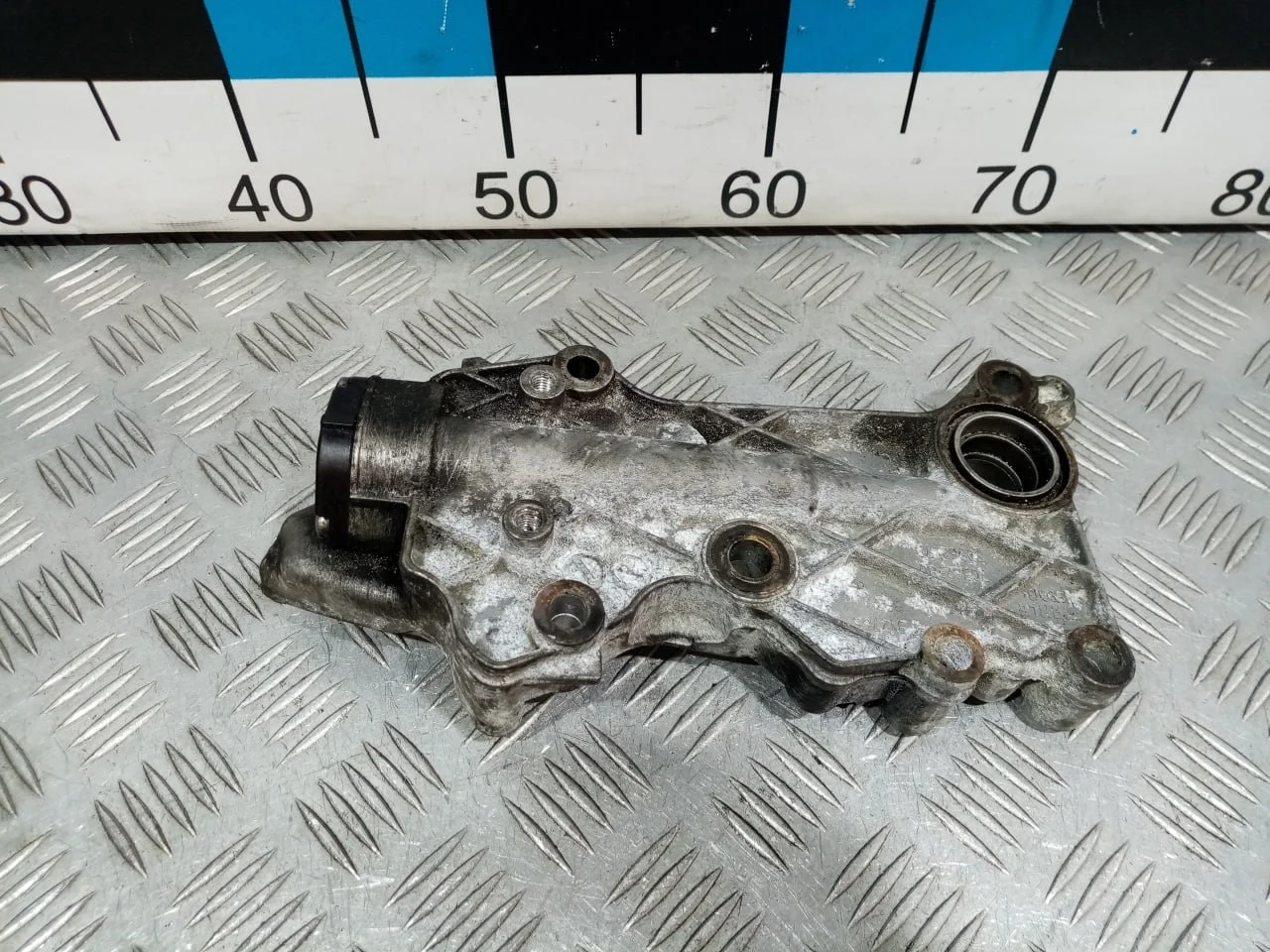 [ЧАСТЬ Б/У] Корпус масляного фильтра - (Состояние: только кронштейн) [ХОРОШЕЕ] [Код: 00635060 ]