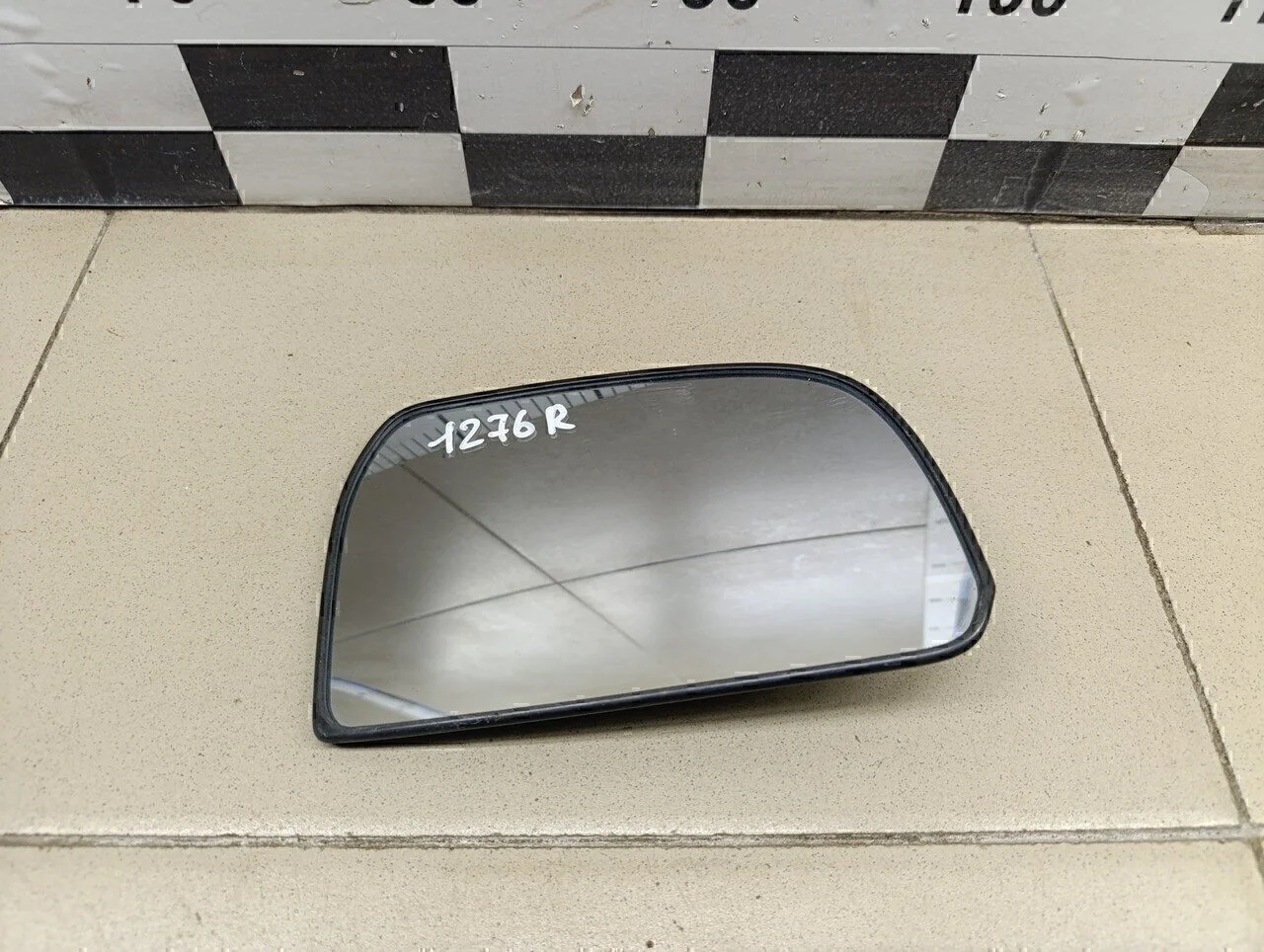 Стекло зеркала правого Tucson 2004-2010