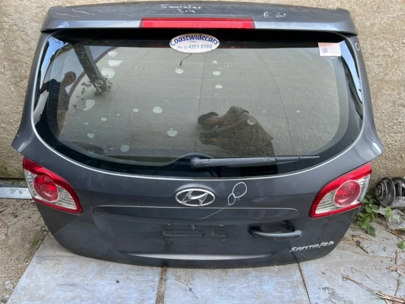 Дверь багажника Hyundai Santa Fe 2014 737002B100 CM