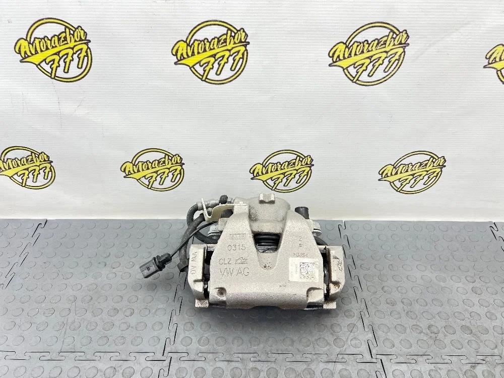 Суппорт тормозной передний левый Audi A4 B9 (2015—2020)