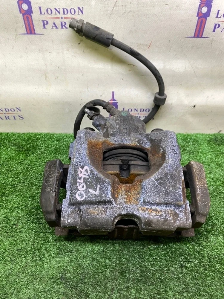 Суппорт тормозной BMW 320i E90