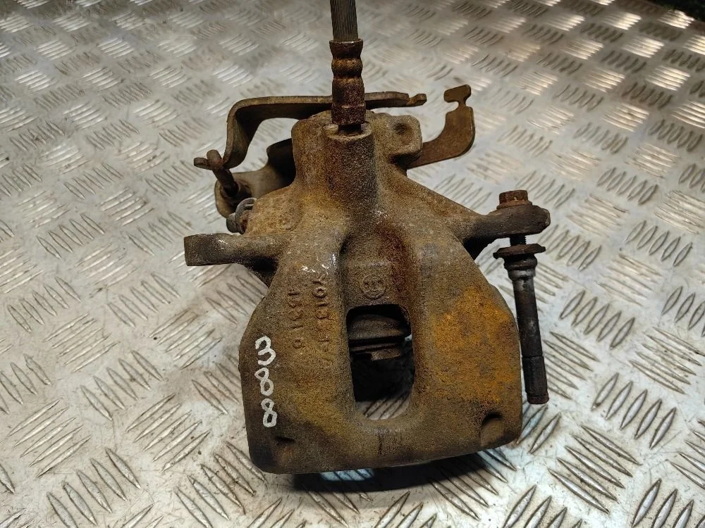 Суппорт тормозной задний левый Ford Transit 7