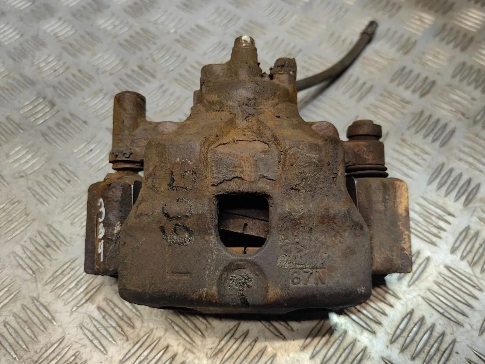 Суппорт тормозной передний левый Mazda 6 GG