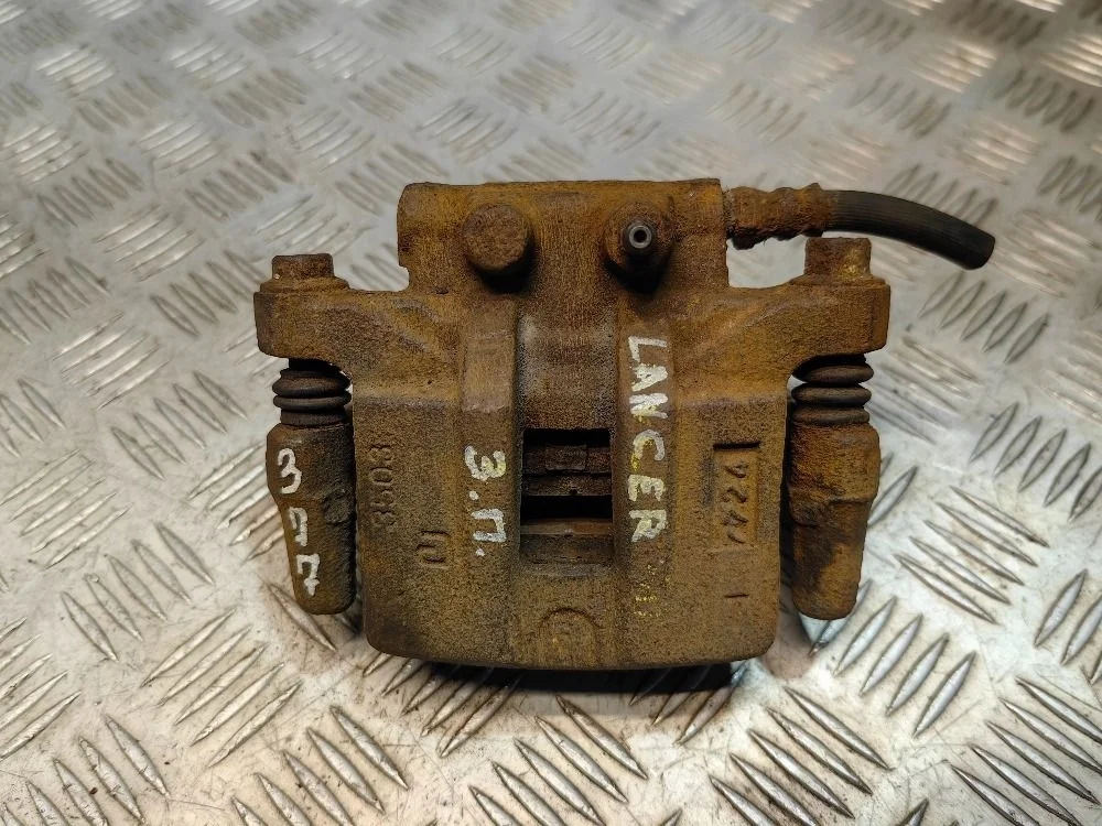 Суппорт задний правый Mitsubishi Lancer 10