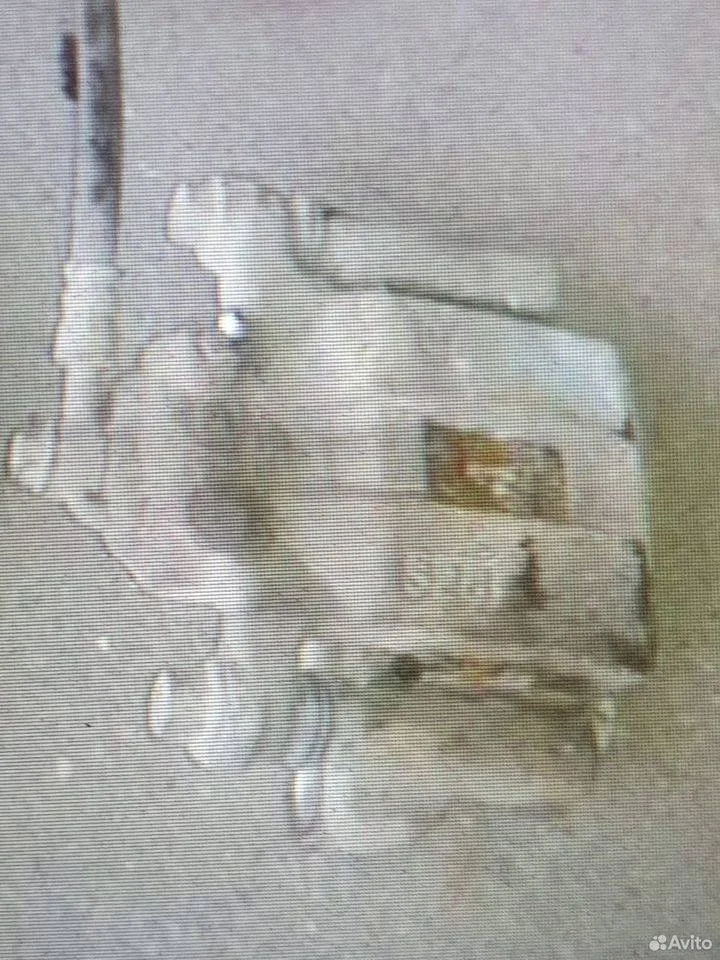 Суппорт задний левый Nissan X-Trail II (2007—2011)