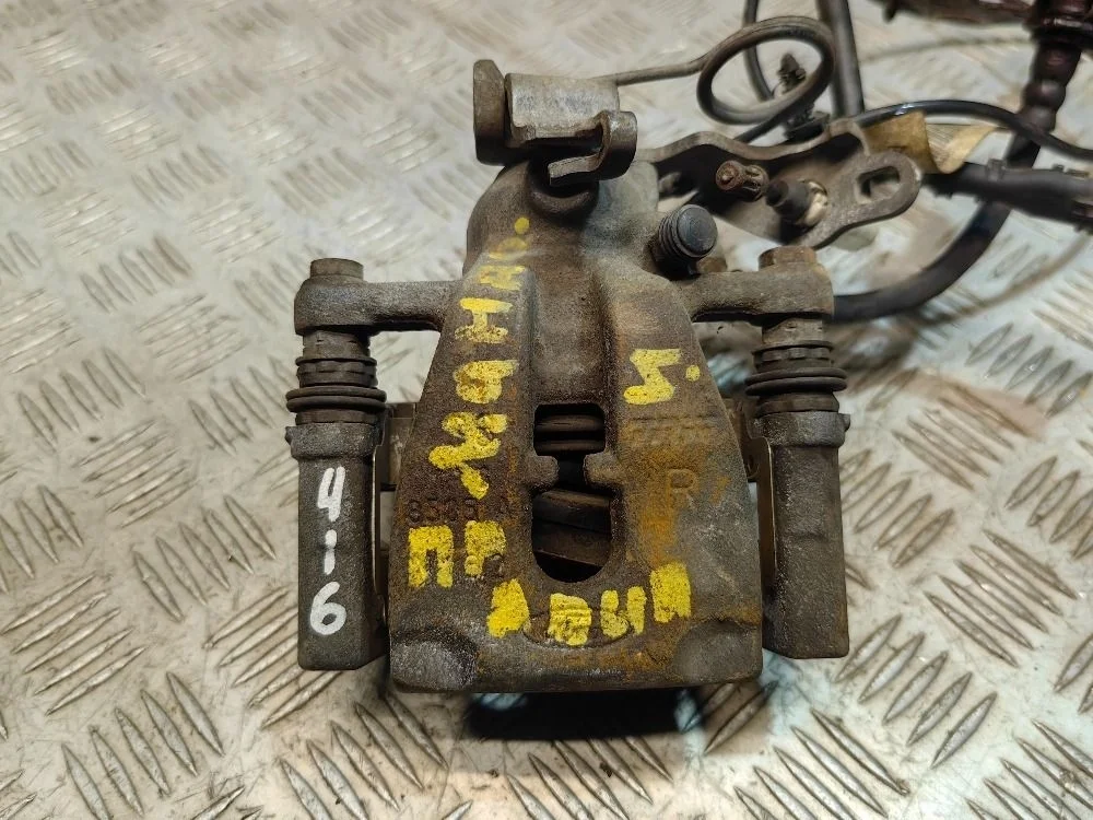 Суппорт тормозной задний правый Ford Mondeo 4